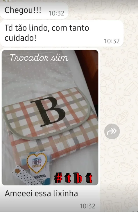 Feedback real no WhatsApp sobre o trocador slim bordado.